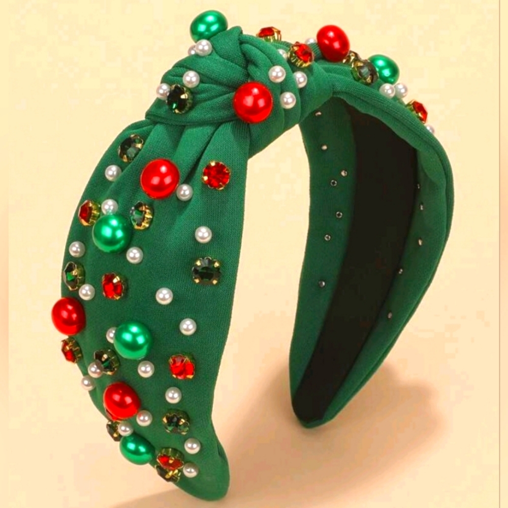 Green headband with multicolored stones and pearls